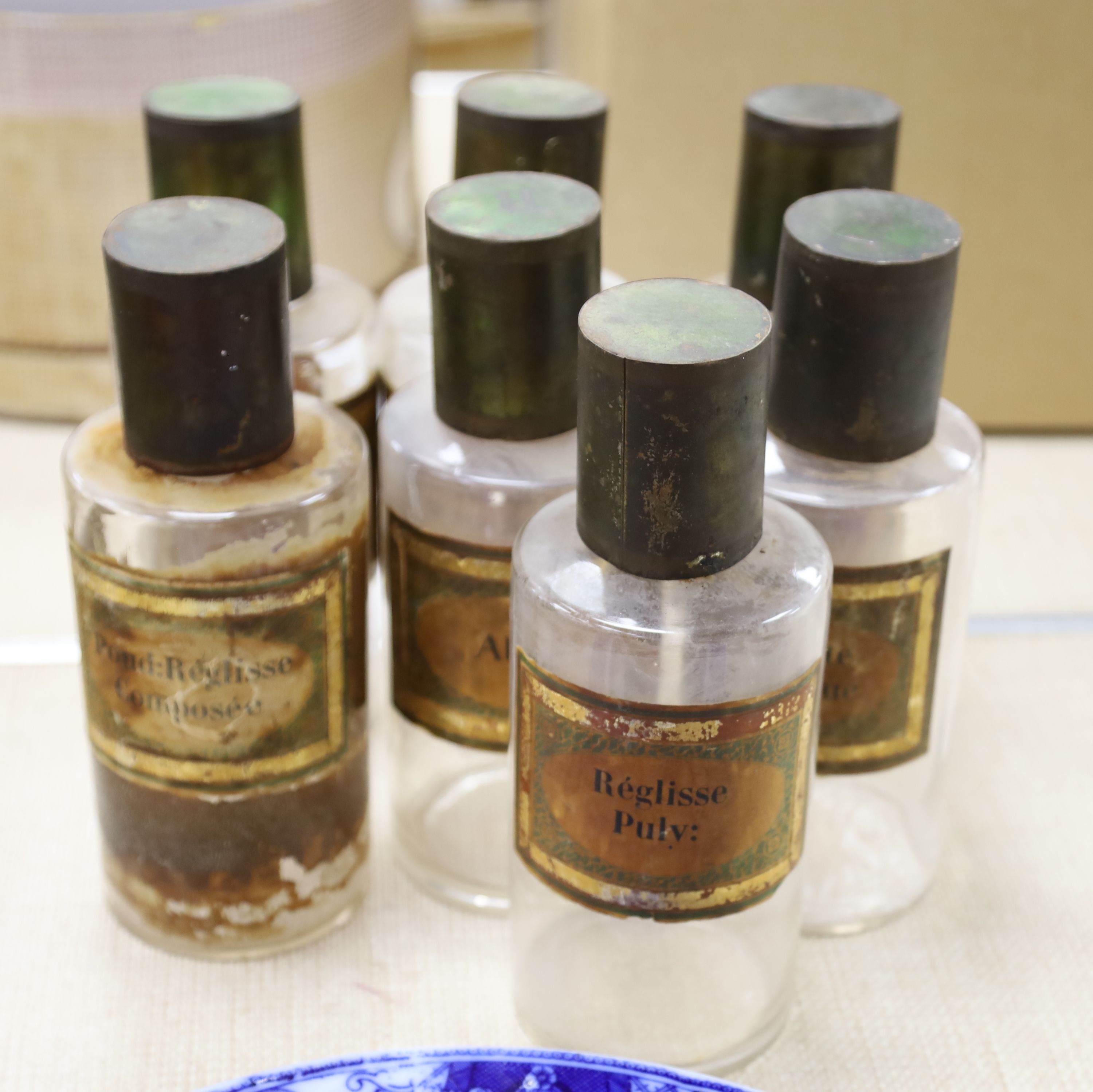 Seven vintage French glass pharmacy jars